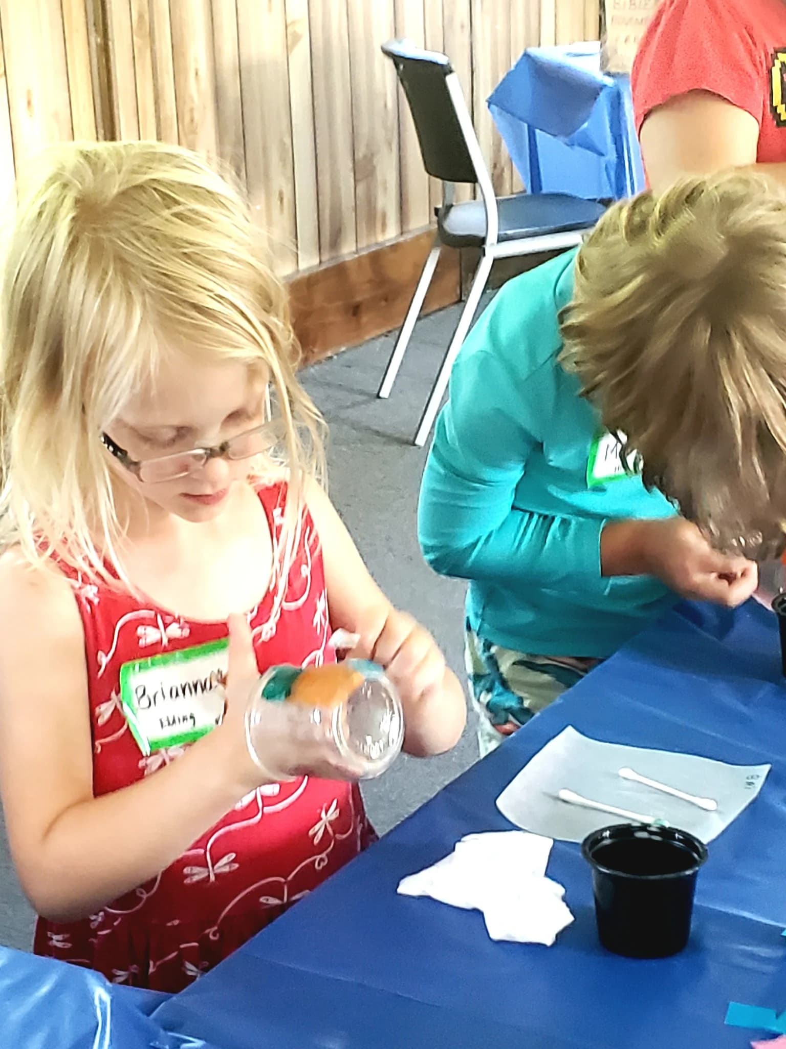 Children making crafts at Lighthouse’s vacation Bible school